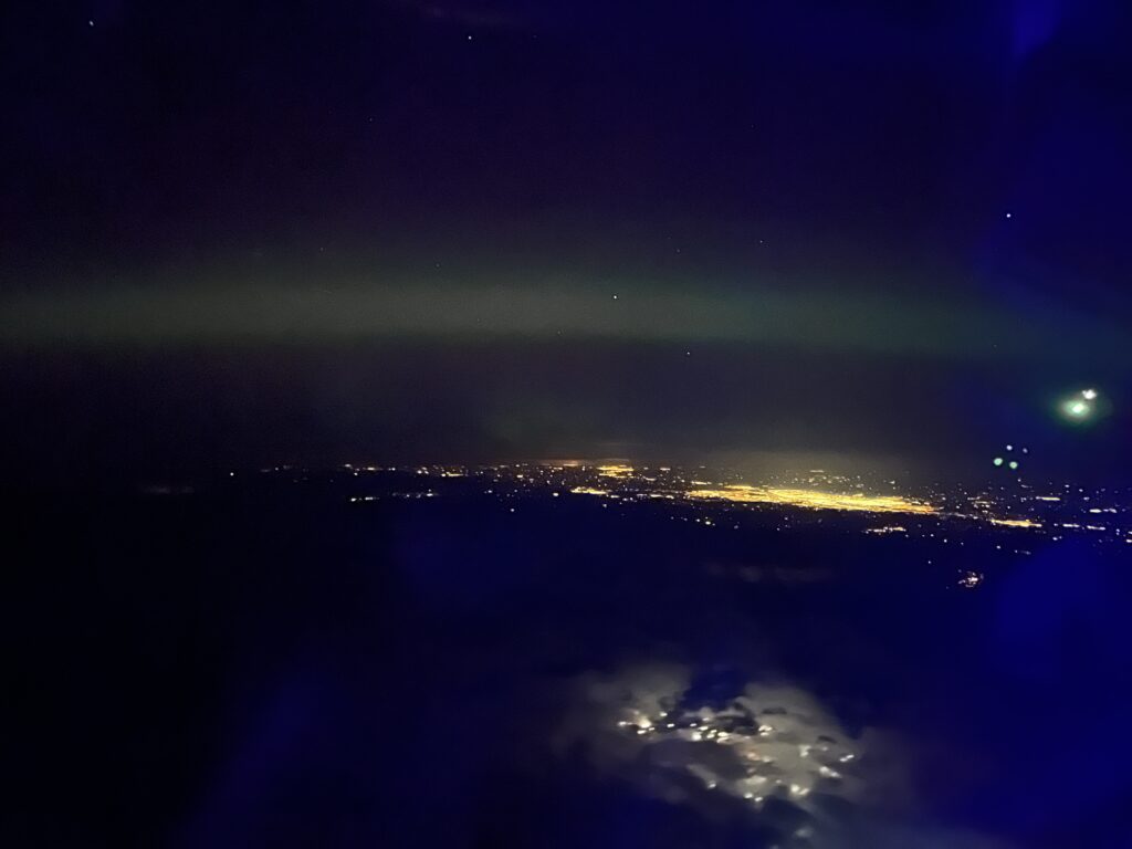 Calgary to the northeast, with lights in the elk valley below.